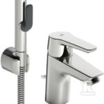 Bateria umywalkowa Oras Saga z rączką prysznica Bidetta i zaworem spustowym.